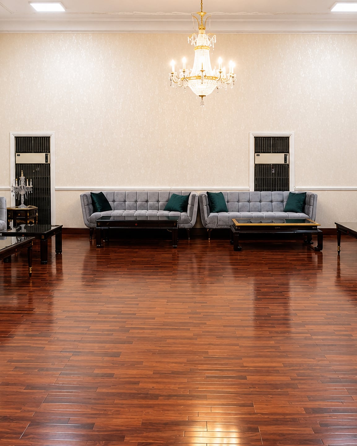 The formal meeting room at The Palace Banquet, chandelier above a polished timber floor